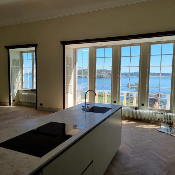 Interior of the kitchen with a lake view