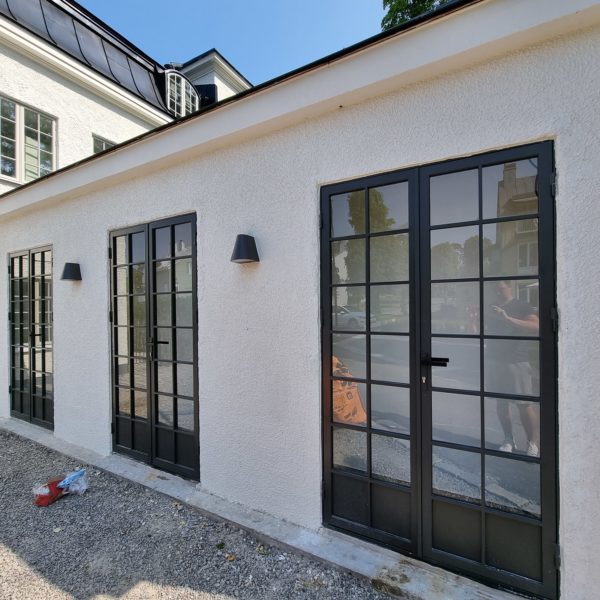 view of a beautiful house exterior and front doors